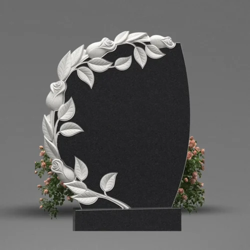 Granitowa tablica nagrobkowa z płaskorzeźbą róż, symbolizująca miłość i pamięć. Precyzyjne wykonanie i elegancja.