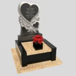 Urnengrabmal mit Herzskulptur aus Granit U 88 Foto 38