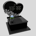 Urnengrabstein mit Herz- und Rosenskulptur U 96 Foto 36